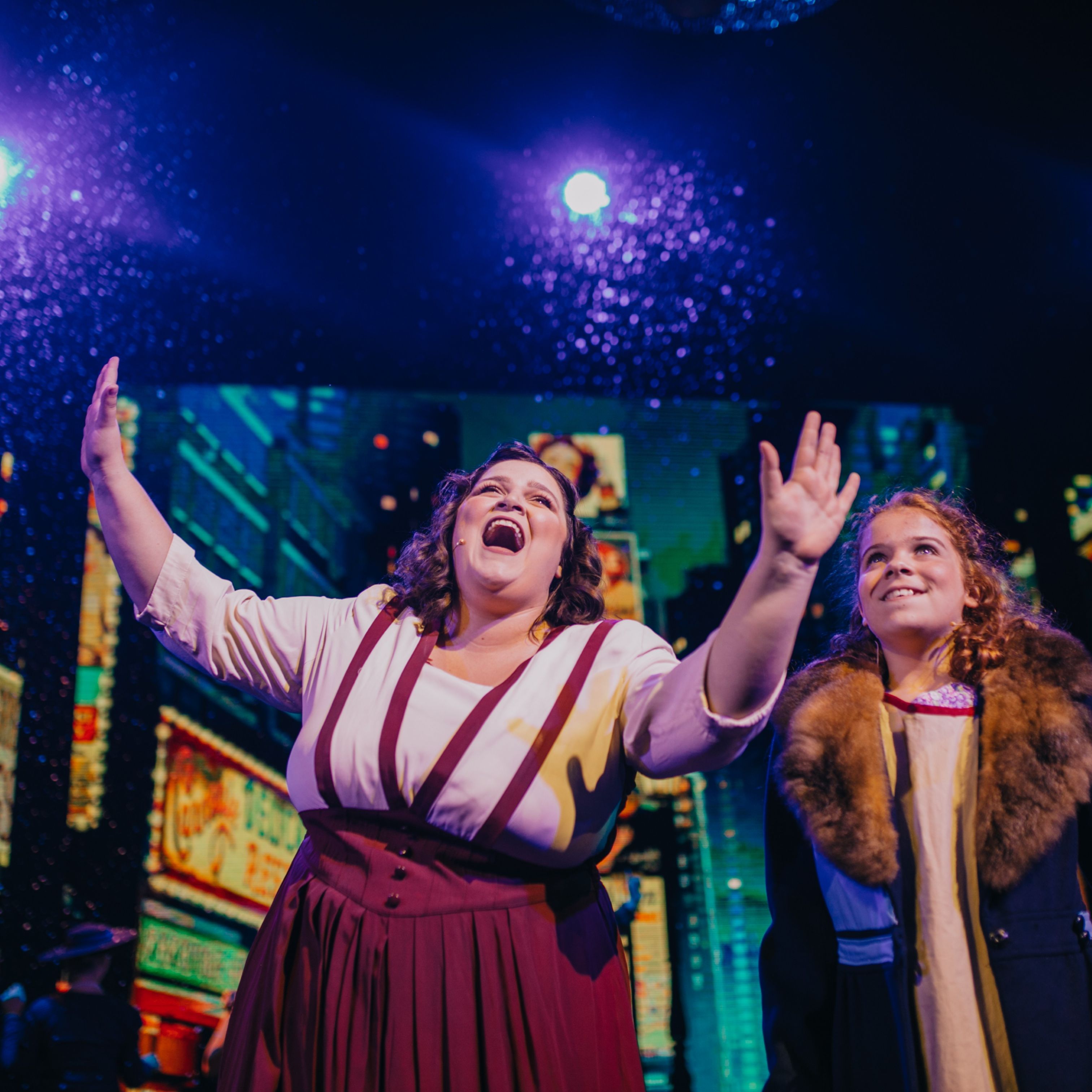 Woman singing in a play